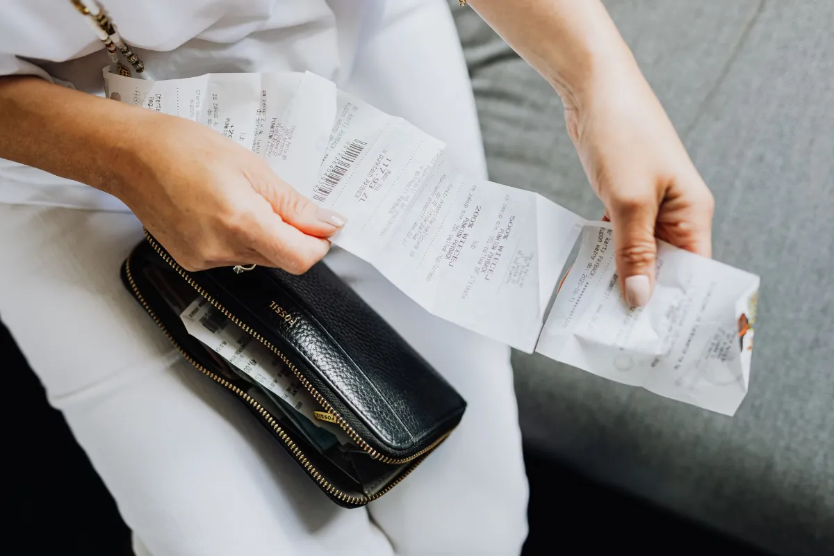 A handful of printed shop receipts, the kind used to enter Malta's fiscal receipts lottery