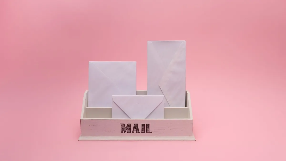 An envelope being posted, representing sending VAT lottery receipts in Malta